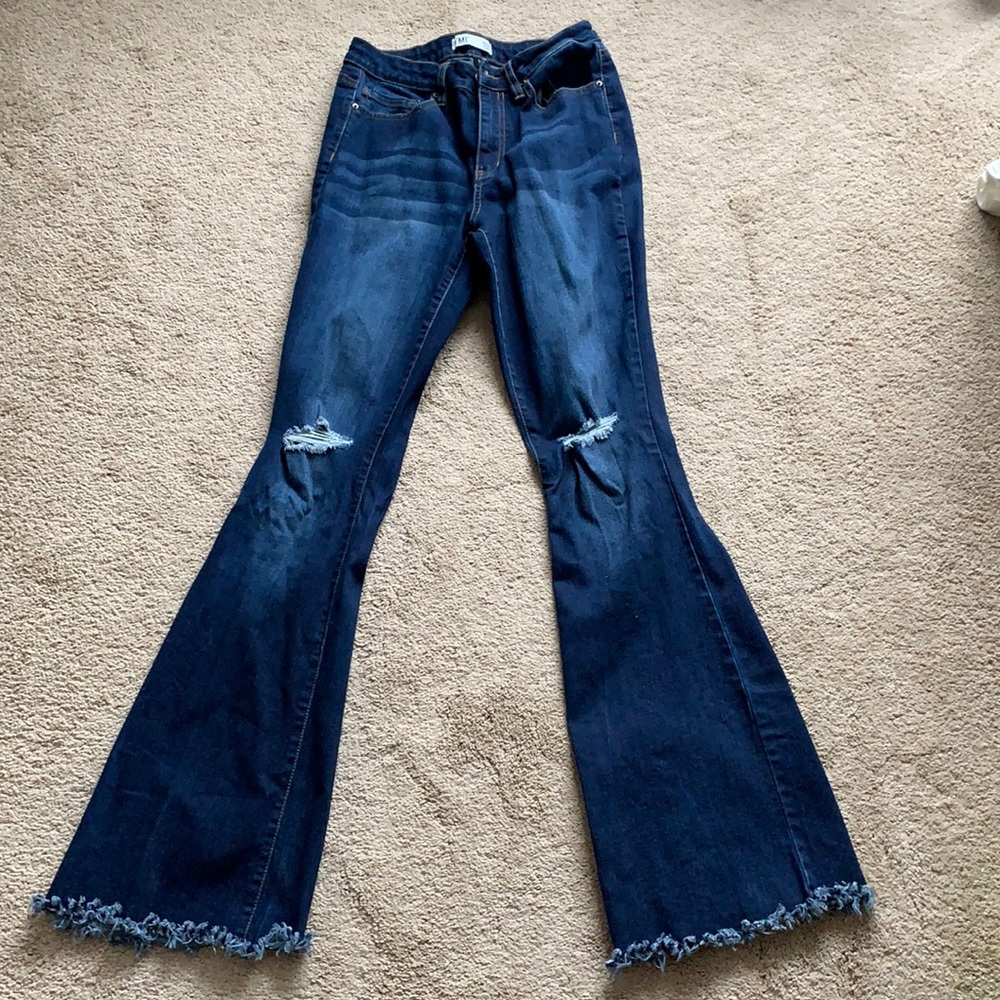 Fashion Nova ripped flare jeans
